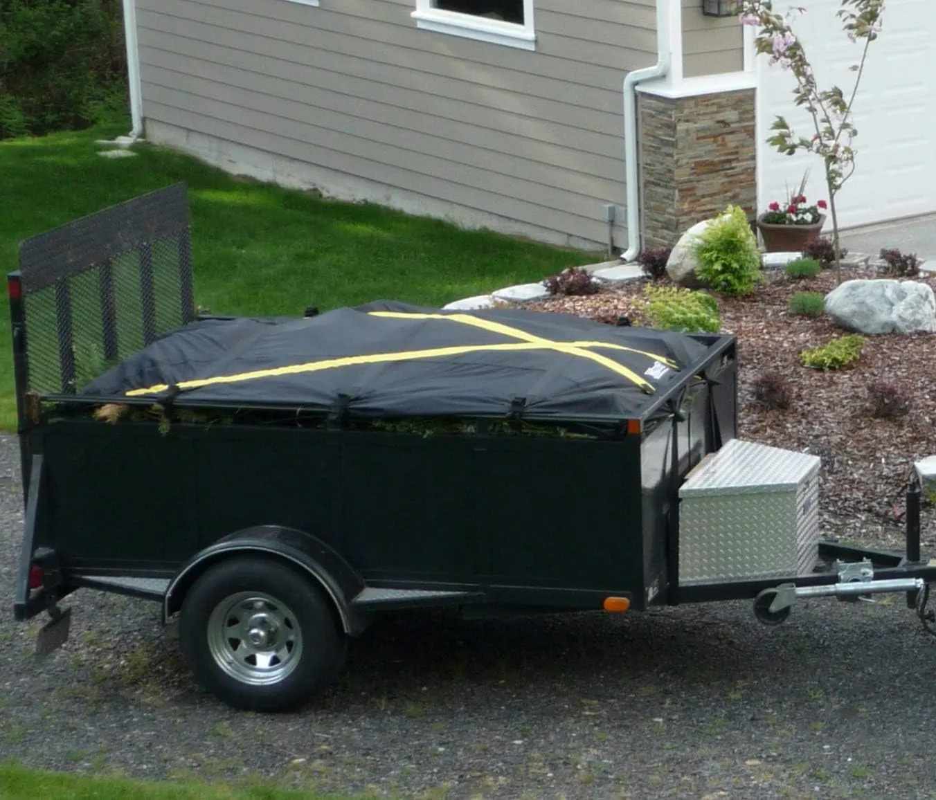 The X-Cover by TRPx - Trailer and Truck Bed Cover Large - Integrated Heavy Duty Black Tarp and Tie Down System. Fits: Standard Bed, Long Bed Trucks and Utility trailers up to 8' long.